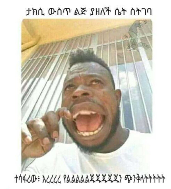 a man with a white shirt and a black face